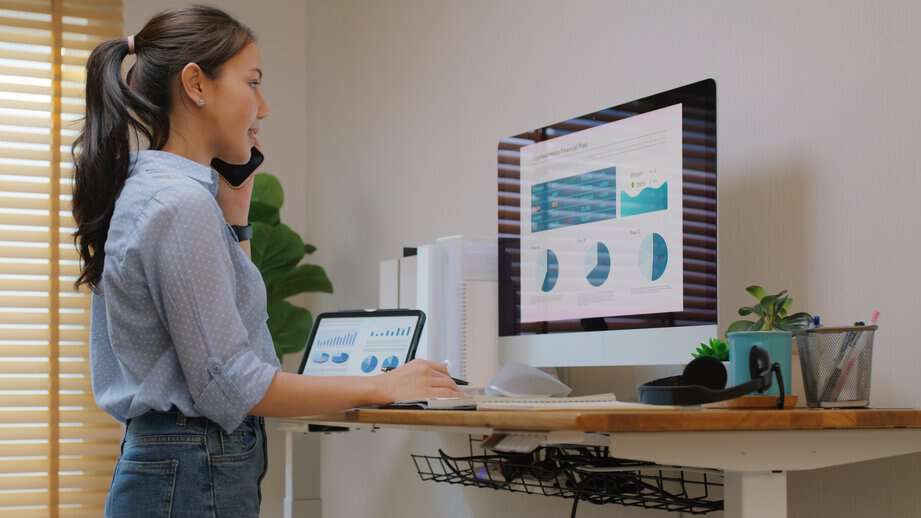 woman working at standing desk