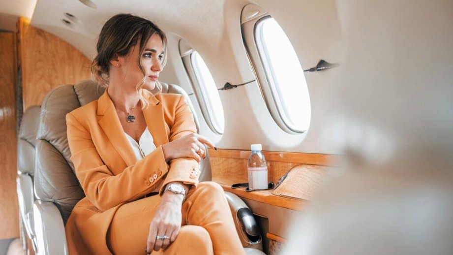 wealthy woman on a private airplane