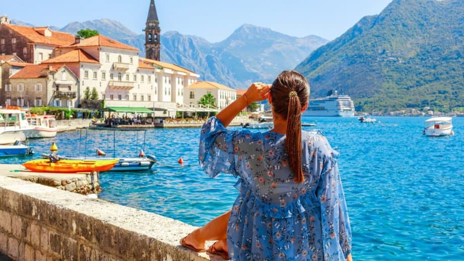 woman looking over Kotor, Montenegro bay