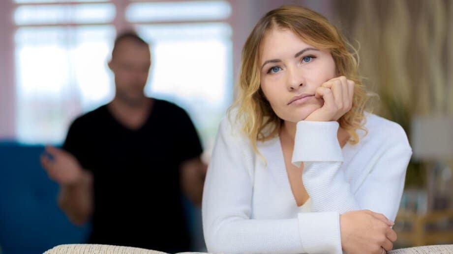 couple fighting woman wondering