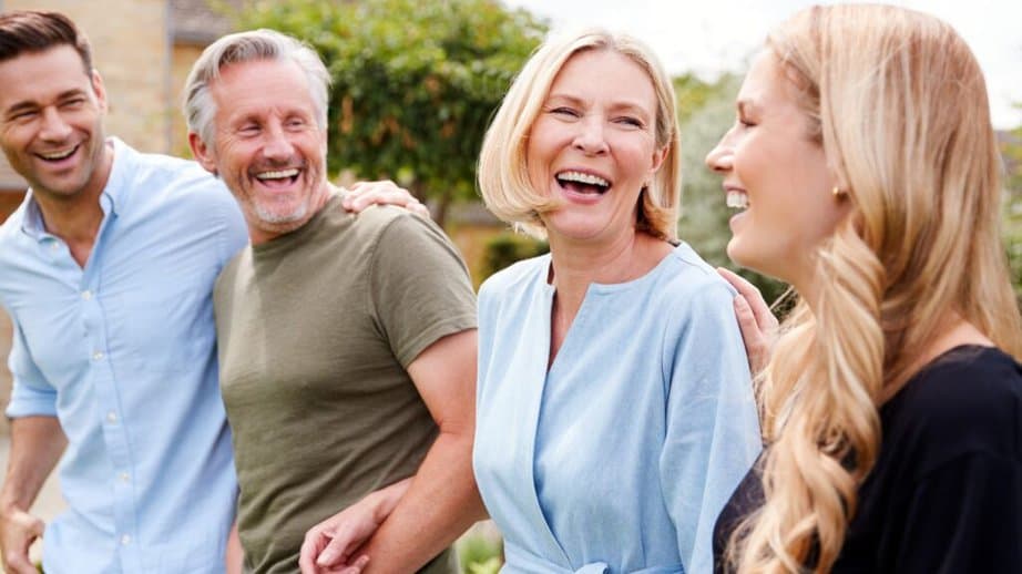 family with older parents laughing