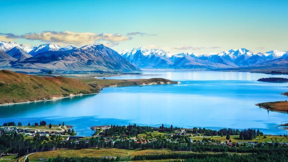 lake tekapo with alps mountains in the background