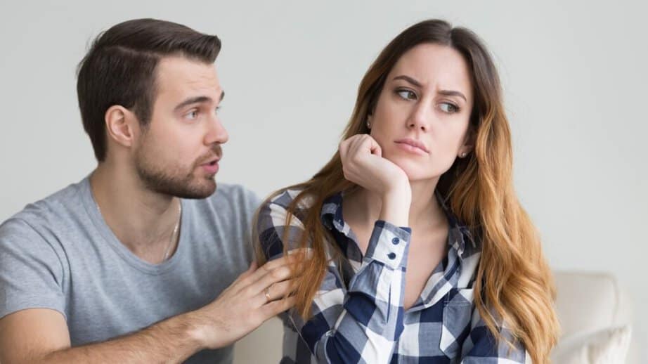 man talking to woman